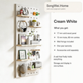 Cream white solid wood pegboard panel with shelves and pegs, shown with accessories