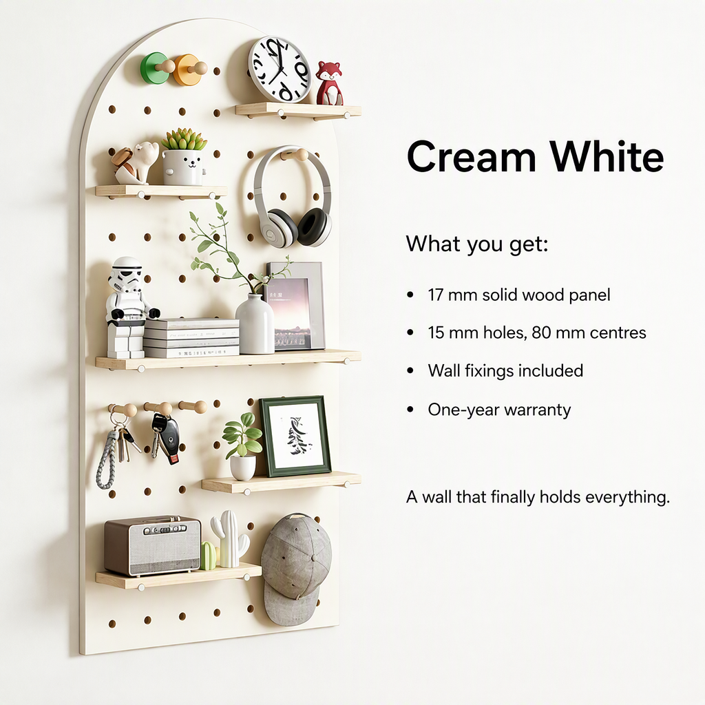 Cream white solid wood pegboard panel with shelves and pegs, shown with accessories