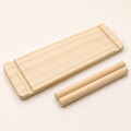 Solid pine pegboard shelf 10 x 30 cm shown with two wooden dowels on a white background