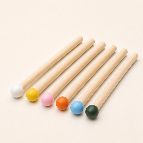 Six coloured wooden matchstick pegs 15 mm by 14.5 cm on a white background