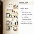 Cream white solid wood pegboard panel with shelves and pegs, shown with accessories